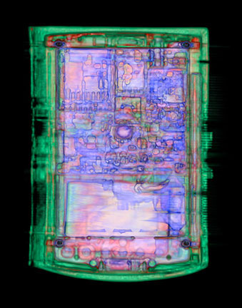 Illustration for article titled CT Scanner Bares Apple Notebook, PS3, and Big Mac to Their Core